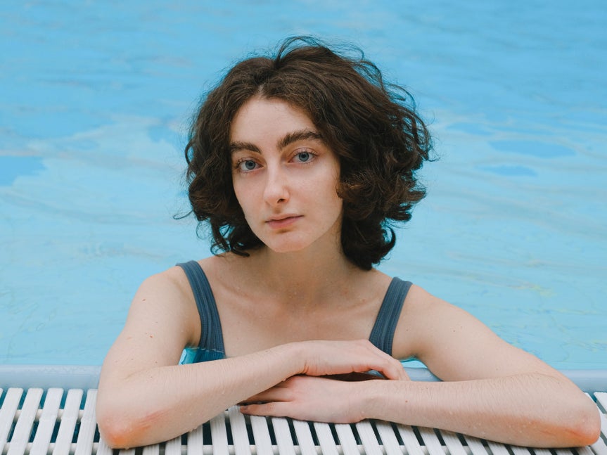 portrait of woman in pool