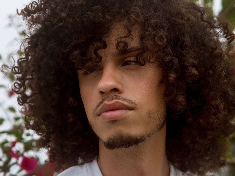 male portrait with curly hair