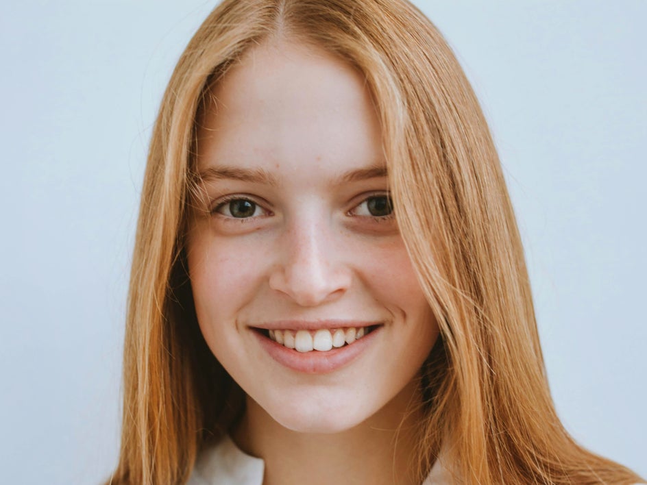 before: photo of blonde woman up close with blank background