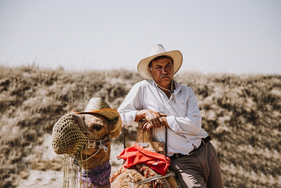 photo of man in wide brimmed hat