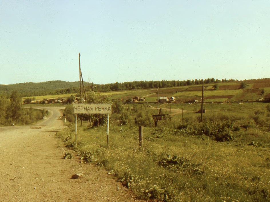 old photo of road with dust removed