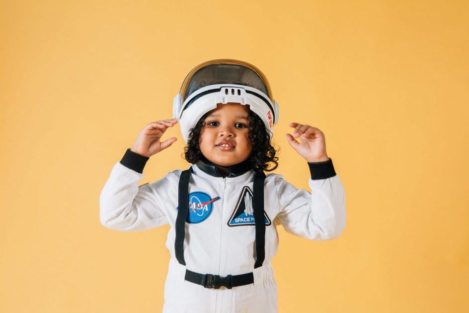 little boy in astronaut costume