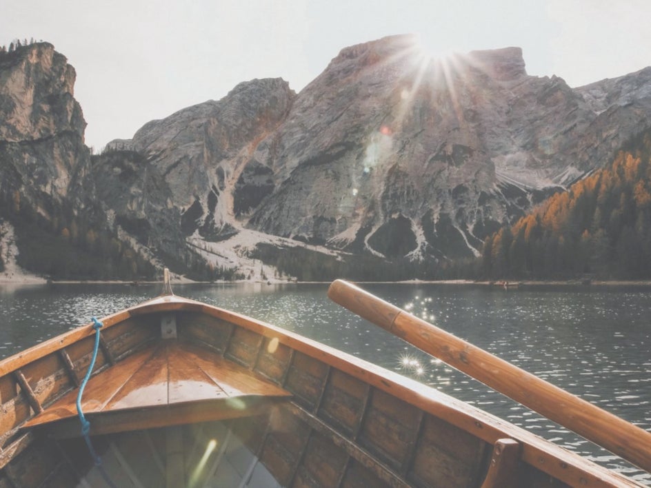 boat in lake with mountains with levels applied