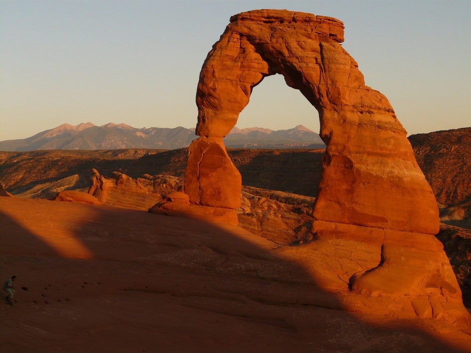 Before: A high-resolution photograph of a canyon, showcasing layered rock formations and natural textures.