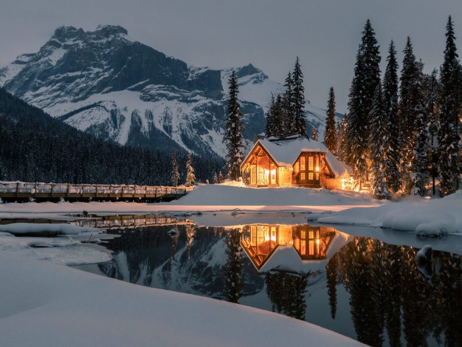 warm cabin in snowy landscape